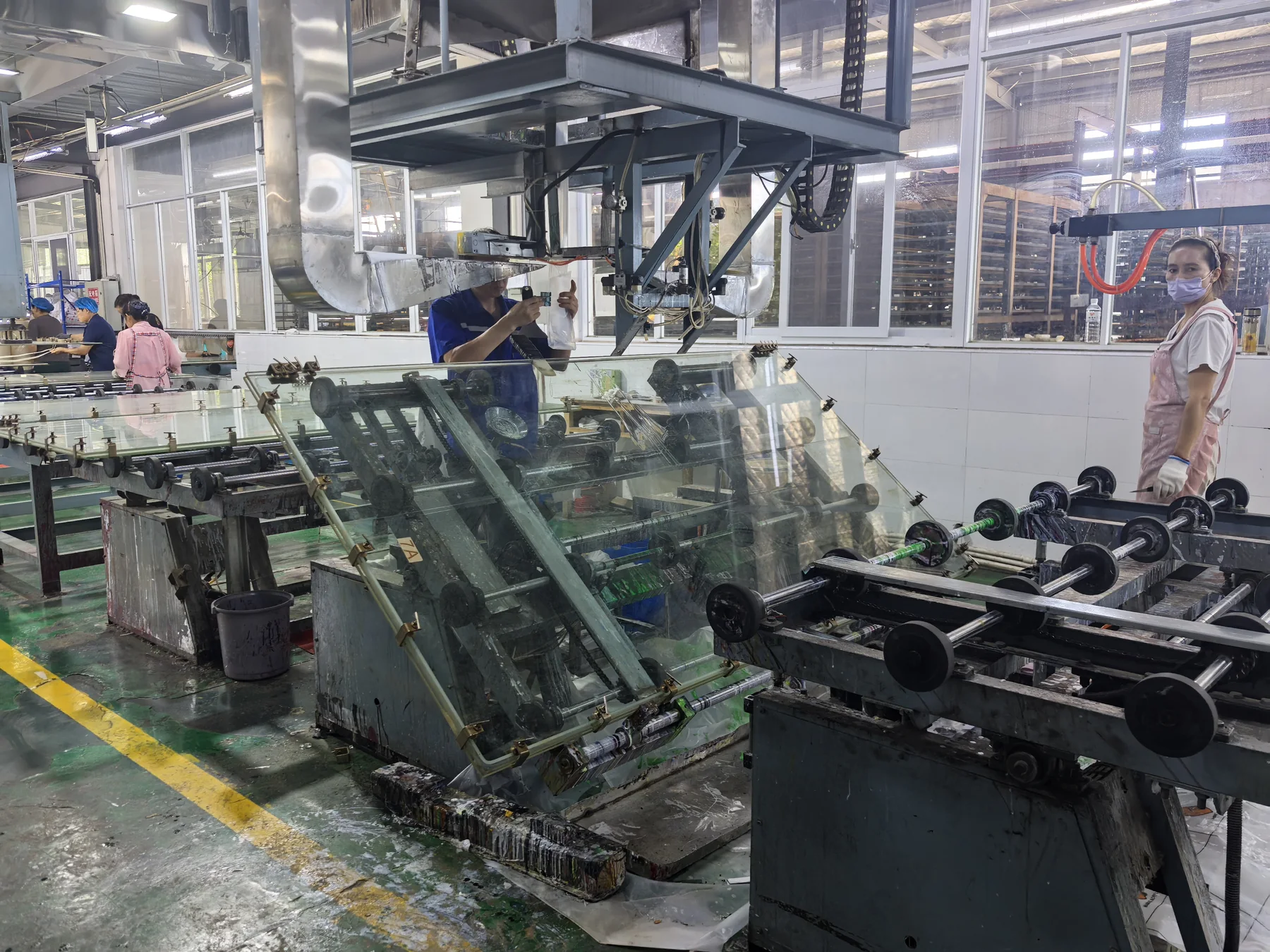 Cast acrylic sheets moving through production and finishing